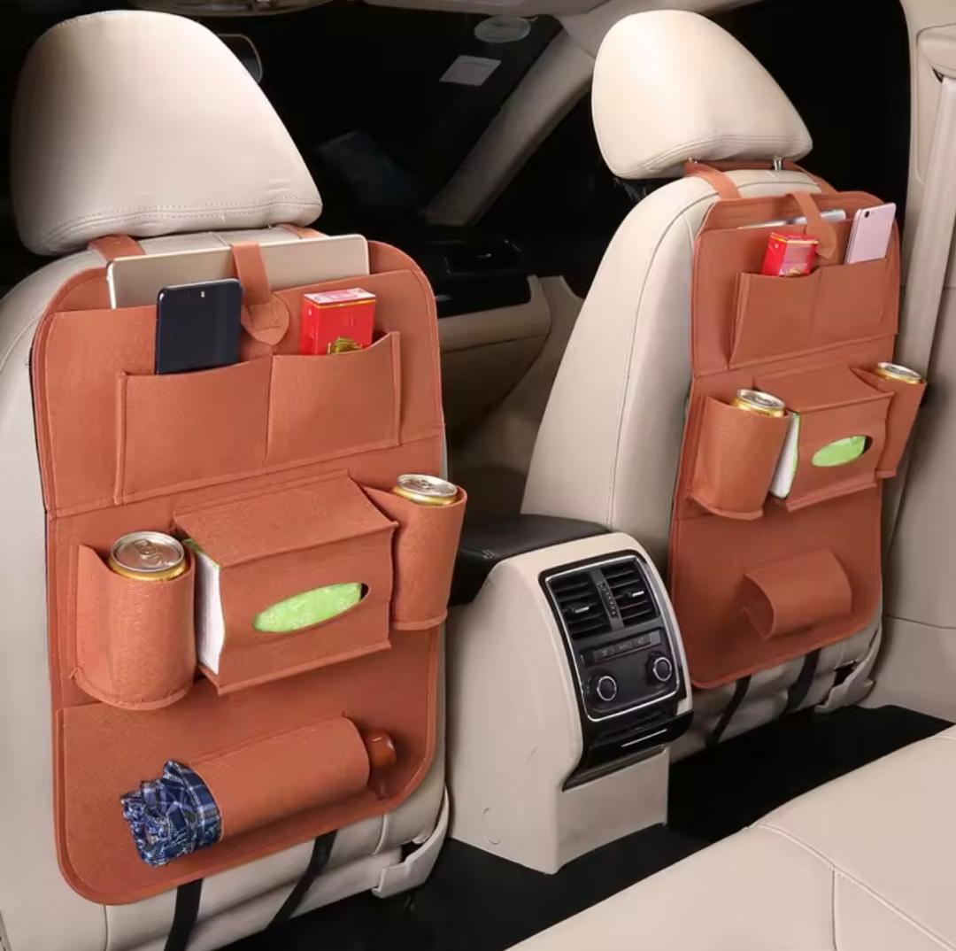 Prix : 1 à 8000f au lieu de 18000f . Nouveau sac de rangement pour siége de voiture, sacs suspendu pour dossier de siège, produit multifonctionnel pour le rangement dans les véhicules.